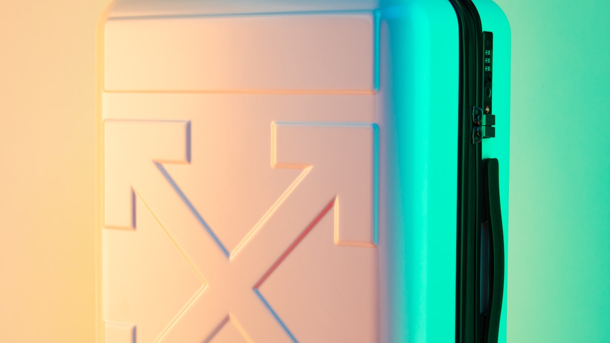 Large suitcases at airport arrival hall ready for transfer